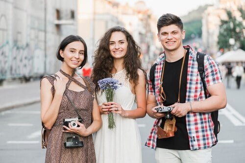 friends standing street with cameras 23 2147846955